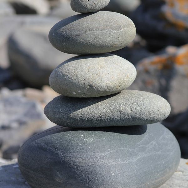 Stacked stones symbolizing balance and mindfulness.